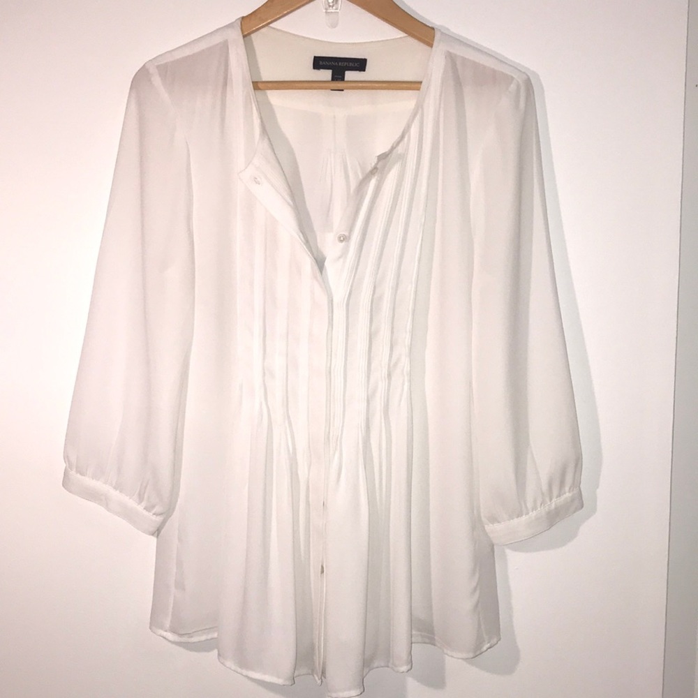 White pleat-front blouse